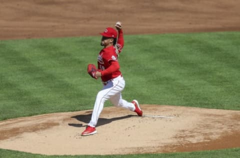 May 1, 2021; Cincinnati, Ohio, USA; Cincinnati Reds starting pitcher Luis Castillo (58) pitches against the Chicago Cubs during the first inning at Great American Ball Park. Mandatory Credit: Katie Stratman-USA TODAY Sports