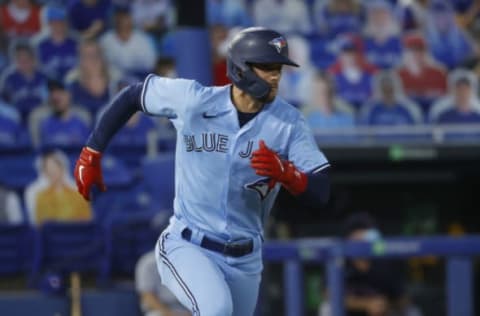 May 18, 2021; Dunedin, Florida, CAN; Toronto Blue Jays third baseman Cavan Biggio (8) singles during the second inning against the Boston Red Sox at TD Ballpark. Mandatory Credit: Kim Klement-USA TODAY Sports