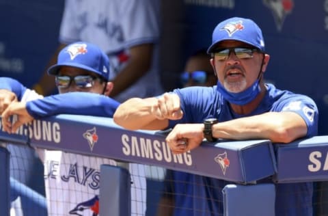 May 24, 2021; Dunedin, Florida, CAN; Toronto Blue Jays pitching coach Pete Walker (40) complains to the umpire after a bases loaded walk in the first inning against the Tampa Bay Rays . Walker was ejected. at TD Ballpark. Mandatory Credit: Jonathan Dyer-USA TODAY Sports