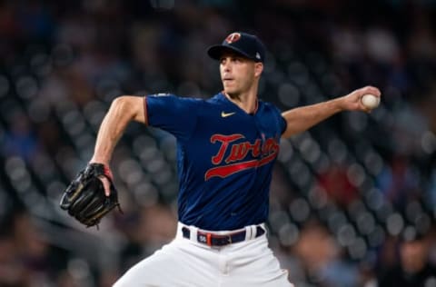 Jun 12, 2021; Minneapolis, Minnesota, USA; Minnesota Twins relief pitcher Taylor Rogers (55) throws against the Houston Astros in the ninth inning at Target Field. Mandatory Credit: Brad Rempel-USA TODAY Sports