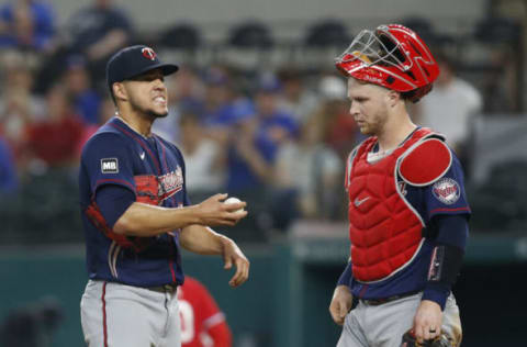 Jun 18, 2021; Arlington, Texas, USA; Minnesota Twins starting pitcher Jose Berrios (17) reacts after being hit by a ball in the third inning against the Texas Rangers at Globe Life Field. Mandatory Credit: Tim Heitman-USA TODAY Sports