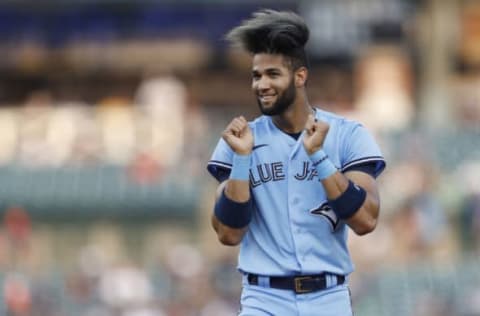 Aug 28, 2021; Detroit, Michigan, USA; Toronto Blue Jays left fielder Lourdes Gurriel Jr. (13) gets excited during the fourth inning against the Detroit Tigers at Comerica Park. Mandatory Credit: Raj Mehta-USA TODAY Sports