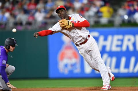 Sep 10, 2021; Philadelphia, Pennsylvania, USA; Philadelphia Phillies shortstop Didi Gregorius (18) turns a double play in the seventh inning against the Colorado Rockies at Citizens Bank Park. Mandatory Credit: Kyle Ross-USA TODAY Sports