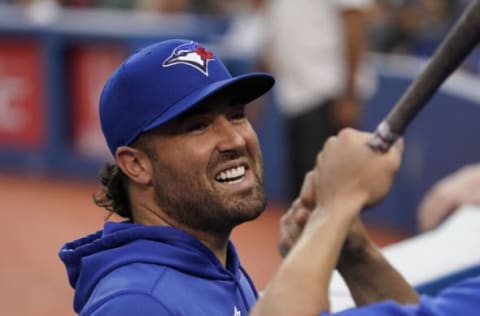 Sep 13, 2021; Toronto, Ontario, CAN; Toronto Blue Jays pitcher Robbie Ray (38) talks with a teammate in the dugout after the first inning against the Tampa Bay Rays at Rogers Centre. Mandatory Credit: John E. Sokolowski-USA TODAY Sports