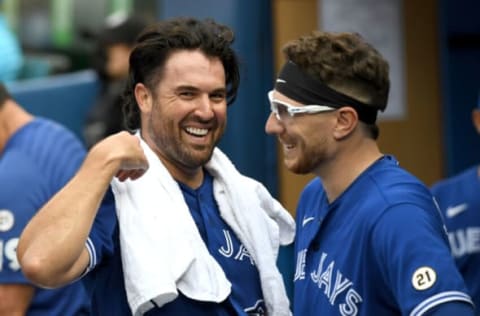 Sep 15, 2021; Toronto, Ontario, CAN; Toronto Blue Jays starting pitcher Robbie Ray (38, left) talks with catcher Danny Jansen (9) after being relieved at the end of the seventh inning against Tampa Bay Rays at Rogers Centre. Mandatory Credit: Dan Hamilton-USA TODAY Sports