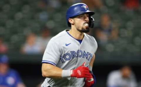 Sep 11, 2021; Baltimore, Maryland, USA; Toronto Blue Jays center fielder Randal Grichuk (15) runs to first base against the Baltimore Orioles at Oriole Park at Camden Yards. Mandatory Credit: Daniel Kucin Jr.-USA TODAY Sports