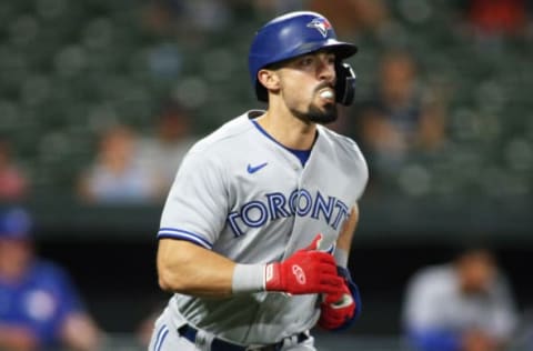 Sep 11, 2021; Baltimore, Maryland, USA; Toronto Blue Jays center fielder Randal Grichuk (15) runs to first base against the Baltimore Orioles at Oriole Park at Camden Yards. Mandatory Credit: Daniel Kucin Jr.-USA TODAY Sports