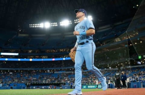 May 1, 2022; Toronto, Ontario, CAN; Toronto Blue Jays third baseman Matt Chapman (26) runs onto the field before the start against the Houston Astros at Rogers Centre. Mandatory Credit: Nick Turchiaro-USA TODAY Sports