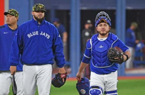 May 21, 2022; Toronto, Ontario, CAN; Toronto Blue Jays starting pitcher Alek Manoah (6) and catcher Alejandro Kirk (30) walk in from the bullpen prior to the game against the Cincinnati Reds at Rogers Centre. Mandatory Credit: Gerry Angus-USA TODAY Sports