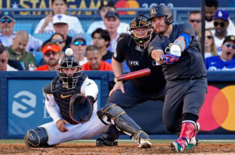 Jul 19, 2022; Los Angeles, California, USA; American League catcher Alejandro Kirk (30) of the Toronto Blue Jays breaks his bat on a foul ball against the National League during the third inning of the 2022 MLB All Star Game at Dodger Stadium. Mandatory Credit: Robert Hanashiro-USA TODAY Sports