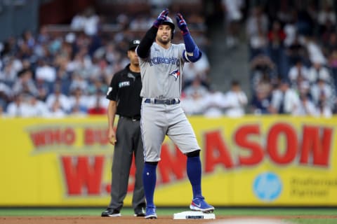 Aug 18, 2022; Bronx, New York, USA; Toronto Blue Jays designated hitter George Springer (4) react after hitting a double against the New York Yankees during the first inning at Yankee Stadium. Mandatory Credit: Brad Penner-USA TODAY Sports