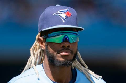 Aug 14, 2022; Toronto, Ontario, CAN; Toronto Blue Jays center fielder Raimel Tapia (15) runs towards the dugout against the Cleveland Guardians during the pregame at Rogers Centre. Mandatory Credit: Nick Turchiaro-USA TODAY Sports