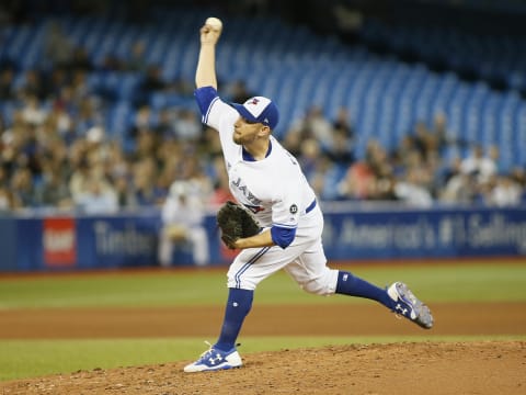 Jun 5, 2018; Toronto, Ontario, CAN; Toronto Blue Jays starting pitcher Marco Estrada (25) pitches to the New York Yankees in the fourth inning at Rogers Centre. Mandatory Credit: John E. Sokolowski-USA TODAY Sports