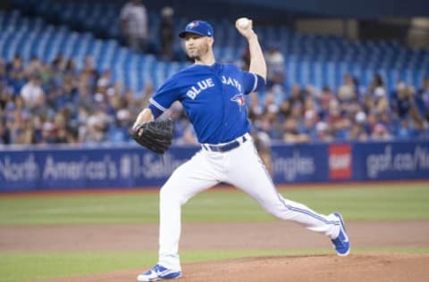 Jul 22, 2018; Toronto, Ontario, CAN; Toronto Blue Jays starting pitcher J.A. Happ (33) throws a pitch during the first inning against the Baltimore Orioles at Rogers Centre. Mandatory Credit: Nick Turchiaro-USA TODAY Sports