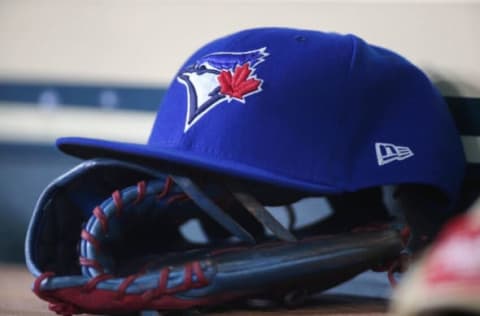 Jun 14, 2019; Houston, TX, USA; General view of a Toronto Blue Jays cap and glove during the game against the Houston Astros at Minute Maid Park. Mandatory Credit: Troy Taormina-USA TODAY Sports