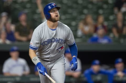 Sep 17, 2019; Baltimore, MD, USA; Toronto Blue Jays first baseman Justin Smoak (14) hits a solo home run in the ninth inning H| at Oriole Park at Camden Yards. Mandatory Credit: Tommy Gilligan-USA TODAY Sports