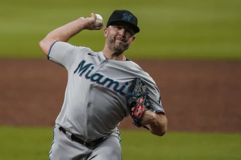 Sep 24, 2020; Cumberland, Georgia, USA; Miami Marlins relief pitcher Brandon Kintzler (27) pitches against the Atlanta Braves during the ninth inning at Truist Park. Mandatory Credit: Dale Zanine-USA TODAY Sports