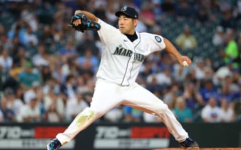 Aug 14, 2021; Seattle, Washington, USA; Seattle Mariners starting pitcher Yusei Kikuchi (18) throws against the Toronto Blue Jays during the fourth inning at T-Mobile Park. Mandatory Credit: Abbie Parr-USA TODAY Sports