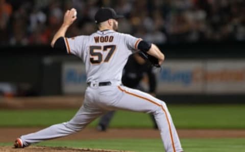 Aug 20, 2021; Oakland, California, USA; San Francisco Giants starting pitcher Alex Wood (57) pitches during the fourth inning against the Oakland Athletics at RingCentral Coliseum. Mandatory Credit: Stan Szeto-USA TODAY Sports