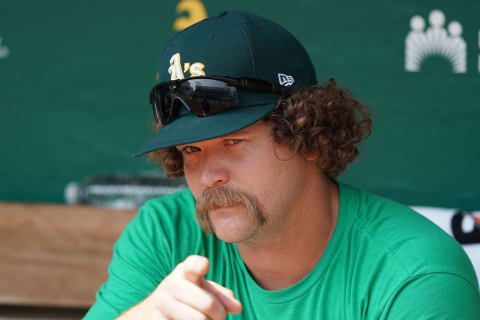 Aug 28, 2021; Oakland, California, USA; Oakland Athletics relief pitcher Andrew Chafin (39) sits in the dugout before the game against the New York Yankees at RingCentral Coliseum. Mandatory Credit: Darren Yamashita-USA TODAY Sports