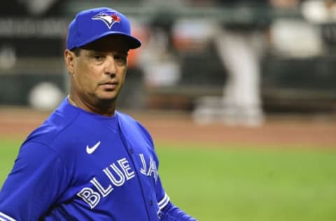 Sep 10, 2021; Baltimore, Maryland, USA; Toronto Blue Jays manager Charlie Montoyo (25) walks off the field during the game against the Baltimore Orioles at Oriole Park at Camden Yards. Mandatory Credit: Tommy Gilligan-USA TODAY Sports