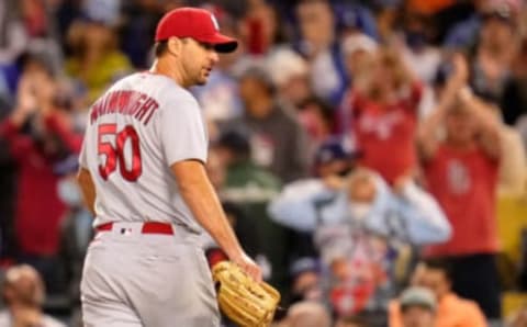 Oct 6, 2021; Los Angeles, California, USA; St. Louis Cardinals starting pitcher Adam Wainwright (50) reacts as he walks off the field after being taken out of the game against the Los Angeles Dodgers during the sixth inning at Dodger Stadium. Mandatory Credit: Robert Hanashiro-USA TODAY Sports