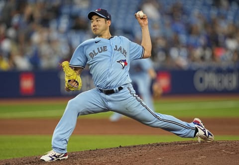 Jun 30, 2022; Toronto, Ontario, CAN; Toronto Blue Jays starting pitcher Yusei Kikuchi (16) throws a pitch to the Tampa Bay Rays during the sixth inning at Rogers Centre. Mandatory Credit: John E. Sokolowski-USA TODAY Sports