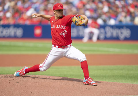 Jul 1, 2022; Toronto, Ontario, CAN; Toronto Blue Jays starting pitcher Jose Berrios (17) throws a pitch against the Tampa Bay Rays during the first inning at Rogers Centre. Mandatory Credit: Nick Turchiaro-USA TODAY Sports