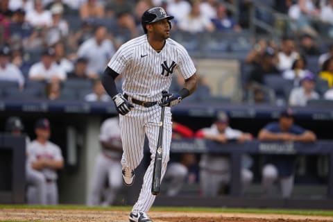 Jul 17, 2022; Bronx, New York, USA; New York Yankees left fielder Aaron Hicks (31) runs out an RBI single against the Boston Red Sox during the fourth inning at Yankee Stadium. Mandatory Credit: Gregory Fisher-USA TODAY Sports