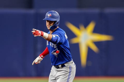 Sep 24, 2022; St. Petersburg, Florida, USA; Toronto Blue Jays center fielder Whit Merrifield (1) reacts after hitting a three-run home run against the Tampa Bay Rays in the seventh inning at Tropicana Field. Mandatory Credit: Nathan Ray Seebeck-USA TODAY Sports