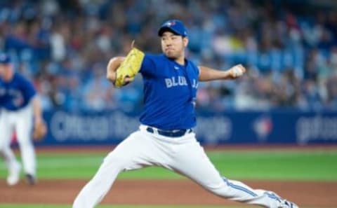 Sep 28, 2022; Toronto, Ontario, CAN; Toronto Blue Jays starting pitcher Yusei Kikuchi (16) throws a pitch against the New York Yankees during the ninth inning at Rogers Centre. Mandatory Credit: Nick Turchiaro-USA TODAY Sports