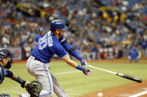 Apr 9, 2017; St. Petersburg, FL, USA; Toronto Blue Jays third baseman Josh Donaldson (20) throws his bat as he swings during the sixth inning against the Tampa Bay Rays at Tropicana Field. Mandatory Credit: Kim Klement-USA TODAY Sports