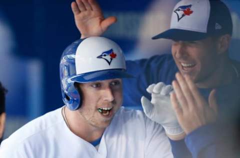 Jun 2, 2017; Toronto, Ontario, CAN; Toronto Blue Jays first baseman Justin Smoak (14) celebrates a two run homerun in the first inning against the New York Yankees at Rogers Centre. Mandatory Credit: John E. Sokolowski-USA TODAY Sports