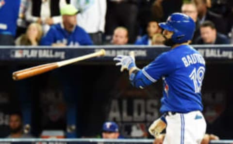 Oct 14, 2015; Toronto, Ontario, CAN; Toronto Blue Jays right fielder Jose Bautista (19) reacts after hitting a three run home run during the seventh inning against the Texas Rangers in game five of the ALDS at Rogers Centre. Mandatory Credit: Dan Hamilton-USA TODAY Sports