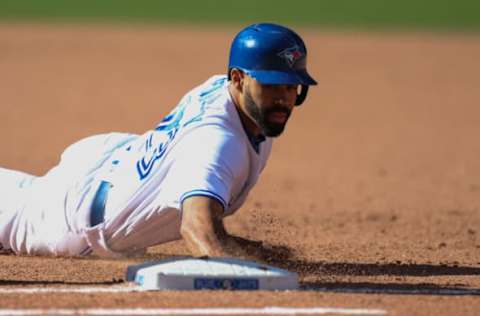 Sep 25, 2016; Toronto, Ontario, CAN; Toronto Blue Jays center fielder Dalton Pompey (23) touches first base in the eighth inning against New York Yankees at Rogers Centre. Mandatory Credit: Kevin Sousa-USA TODAY Sports