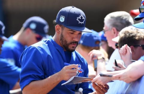 Mar 1, 2017; Dunedin, FL, USA; Toronto Blue Jays infielder Devon Travis (29) signs autographs before the spring training game against the Detroit Tigers at Florida Auto Exchange Stadium. Mandatory Credit: Jonathan Dyer-USA TODAY Sports