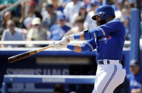 Mar 3, 2017; Dunedin, FL, USA; Toronto Blue Jays right fielder Jose Bautista (19) hits a 2-run home run during the first inning against the New York Yankees at Florida Auto Exchange Stadium. Mandatory Credit: Kim Klement-USA TODAY Sports