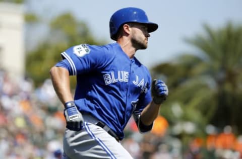 Mar 21, 2017; Sarasota, FL, USA; Toronto Blue Jays third baseman Jon Berti (60) hits a 2-RBI single during the fourth inning against the Baltimore Orioles at Ed Smith Stadium. Mandatory Credit: Kim Klement-USA TODAY Sports