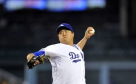 September 6, 2014; Los Angeles, CA, USA; Los Angeles Dodgers starting pitcher Hyun-Jin Ryu (99) pitches the fifth inning against the Arizona Diamondbacks at Dodger Stadium. Mandatory Credit: Gary A. Vasquez-USA TODAY Sports