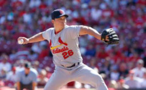 Sep 4, 2016; Cincinnati, OH, USA; St. Louis Cardinals relief pitcher Seung Hwan Oh throws a pitch against the Cincinnati Reds during the ninth inning at Great American Ball Park. The Cardinals won 5-2. Mandatory Credit: David Kohl-USA TODAY Sports