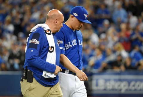 Oct 4, 2016; Toronto, Ontario, CAN; Toronto Blue Jays relief pitcher Roberto Osuna (54) leaves the game in the tenth inning with an apparent injury in the American League wild-card playoff baseball game against the Baltimore Orioles at Rogers Centre. Mandatory Credit: Dan Hamilton-USA TODAY Sports