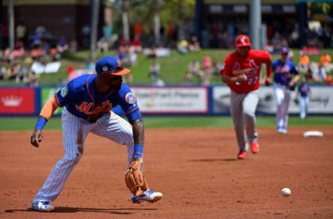 Mar 28, 2017; Port St. Lucie, FL, USA; New York Mets third baseman Jose Reyes (7) fields a ground ball before throwing to first base for an out against the St. Louis Cardinals during a spring training game at First Data Field. Mandatory Credit: Jasen Vinlove-USA TODAY Sports