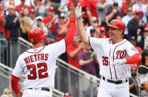 Apr 3, 2017; Washington, DC, USA; Washington Nationals pinch hitter Adam Lind (26) is congratulated by Washington Nationals catcher Matt Wieters (32) after hitting a two run home run against the Miami Marlins during the seventh inning at Nationals Park. Washington Nationals won 4 – 2. Mandatory Credit: Brad Mills-USA TODAY Sports