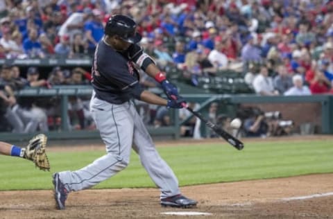 Apr 3, 2017; Arlington, TX, USA; Cleveland Indians first baseman Edwin Encarnacion (10) hits a home run during the eighth inning to tie the game against the Texas Rangers at Globe Life Park in Arlington. The Indians defeat the Rangers 8-5. Mandatory Credit: Jerome Miron-USA TODAY Sports