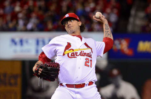 Apr 4, 2017; St. Louis, MO, USA; St. Louis Cardinals relief pitcher Brett Cecil (21) pitches to a Chicago Cubs batter during the seventh inning at Busch Stadium. The Cubs won 2-1. Mandatory Credit: Jeff Curry-USA TODAY Sports