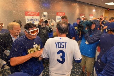 Sep 30, 2014; Kansas City, MO, USA; Kansas City Royals manager Ned Yost (3) celebrates with his team after they defeated the Oakland Athletics in the 2014 American League Wild Card playoff baseball game at Kauffman Stadium. The Royals won 9-8. Mandatory Credit: Denny Medley-USA TODAY Sports