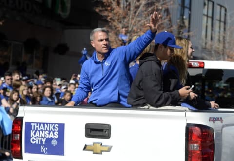 Nov 3, 2015; Kansas City, MO, USA; Kansas City Royals general manager Dayton Moore waves to fans at the World Series parade. Mandatory Credit: John Rieger-USA TODAY Sports