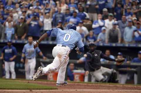 Apr 10, 2016; Kansas City, MO, USA; Kansas City Royals pinch runner Terrance Gore (0) scores from third base on a wild pitch in the tenth inning against the Minesota Twins at Kauffman Stadium. Kansas City won the game 4-3. Mandatory Credit: John Rieger-USA TODAY Sports