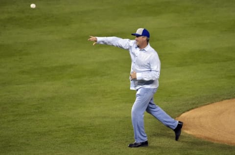 Oct 29, 2014; Kansas City, MO, USA; Kansas City Royals former pitcher Bret Saberhagen throws out the ceremonial first pitch before game seven of the 2014 World Series against the San Francisco Giants at Kauffman Stadium. Mandatory Credit: Denny Medley-USA TODAY Sports