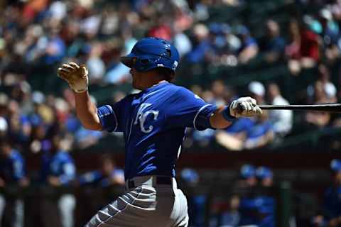 Apr 2, 2016; Phoenix, AZ, USA; Kansas City Royals center fielder Brett Eibner (26) hits a single during the second inning against the Arizona Diamondbacks at Chase Field. Mandatory Credit: Joe Camporeale-USA TODAY Sports